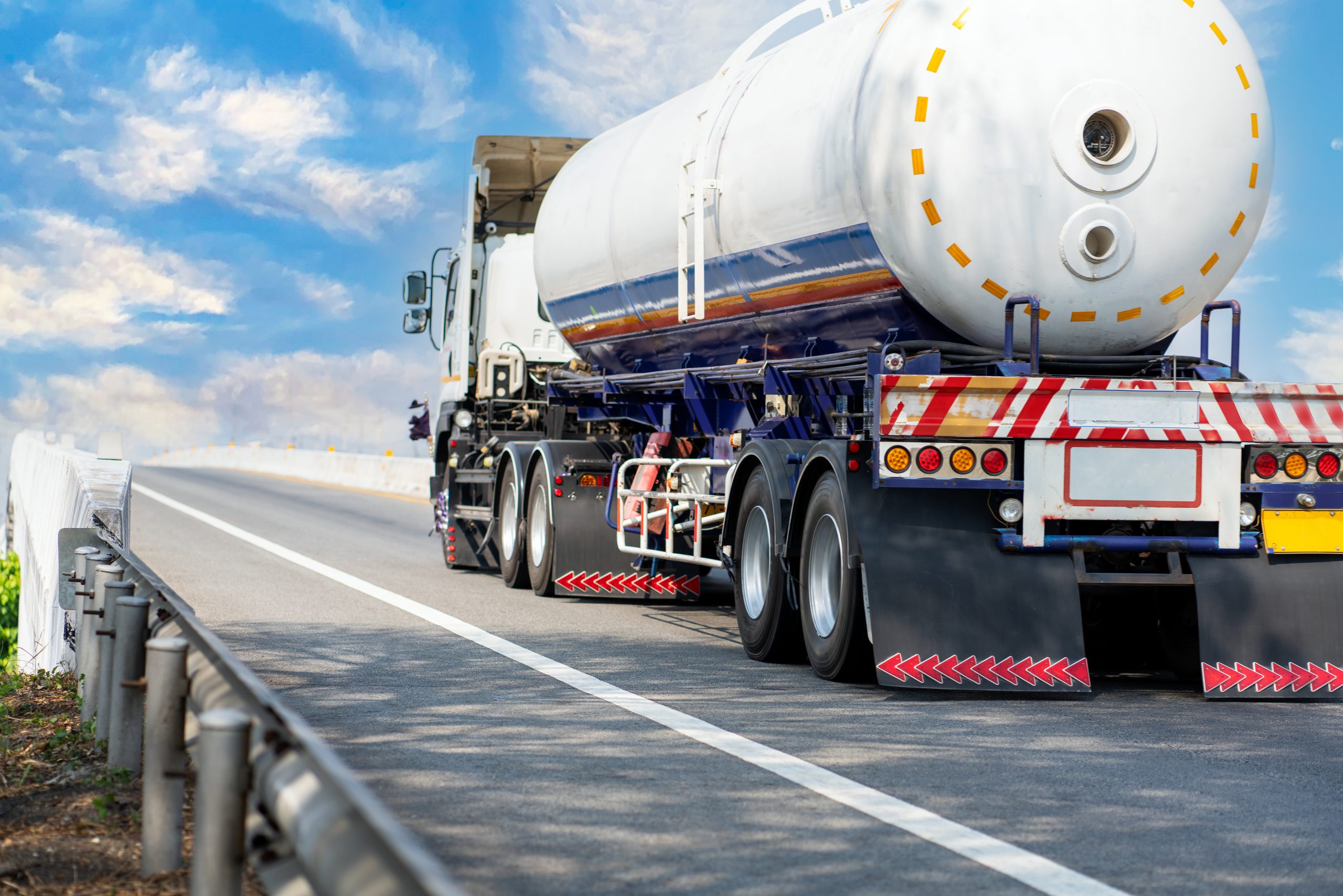 gas truck highway road with tank oil container transportation concept import export logistic industrial transporting land transport asphalt expressway with blue sky